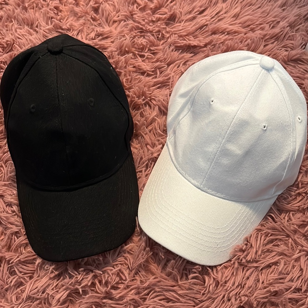 Set of black and white minimalist baseball caps